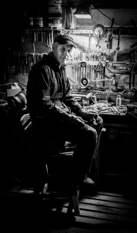Sculptor Tommy Rowe in his studio. Portrait by Kevin Swift