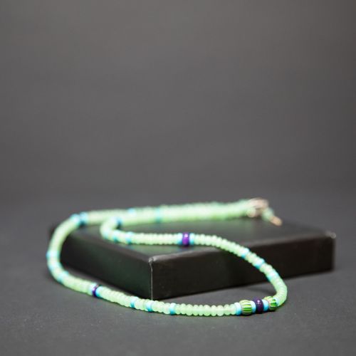 mia necklace by nicoletta george, featuring ancient and modern beads in shades of blue and green