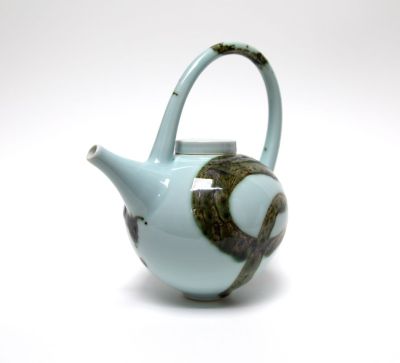 round blue splash teapot by tricia thom