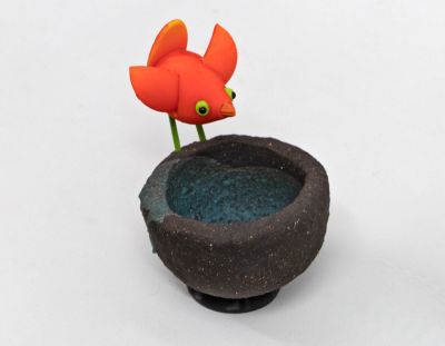 orange bird on black nest I by Chris Barnes