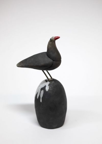 bird on black lump by chris barnes