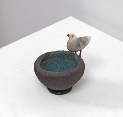 stoneware bird nest III, with grey bird & shell by Chris Barnes