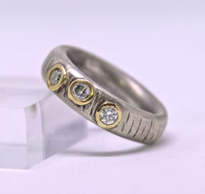 oxidised silver and gold and moissanite ring by ruth hollick