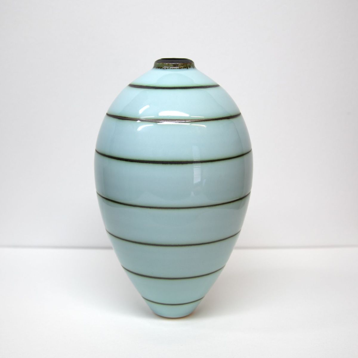 striped oblong vessel by tricia thom