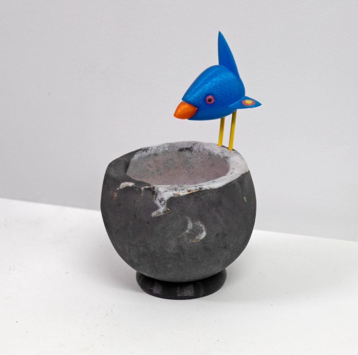 raku bird's nest, with blue bird by Chris Barnes